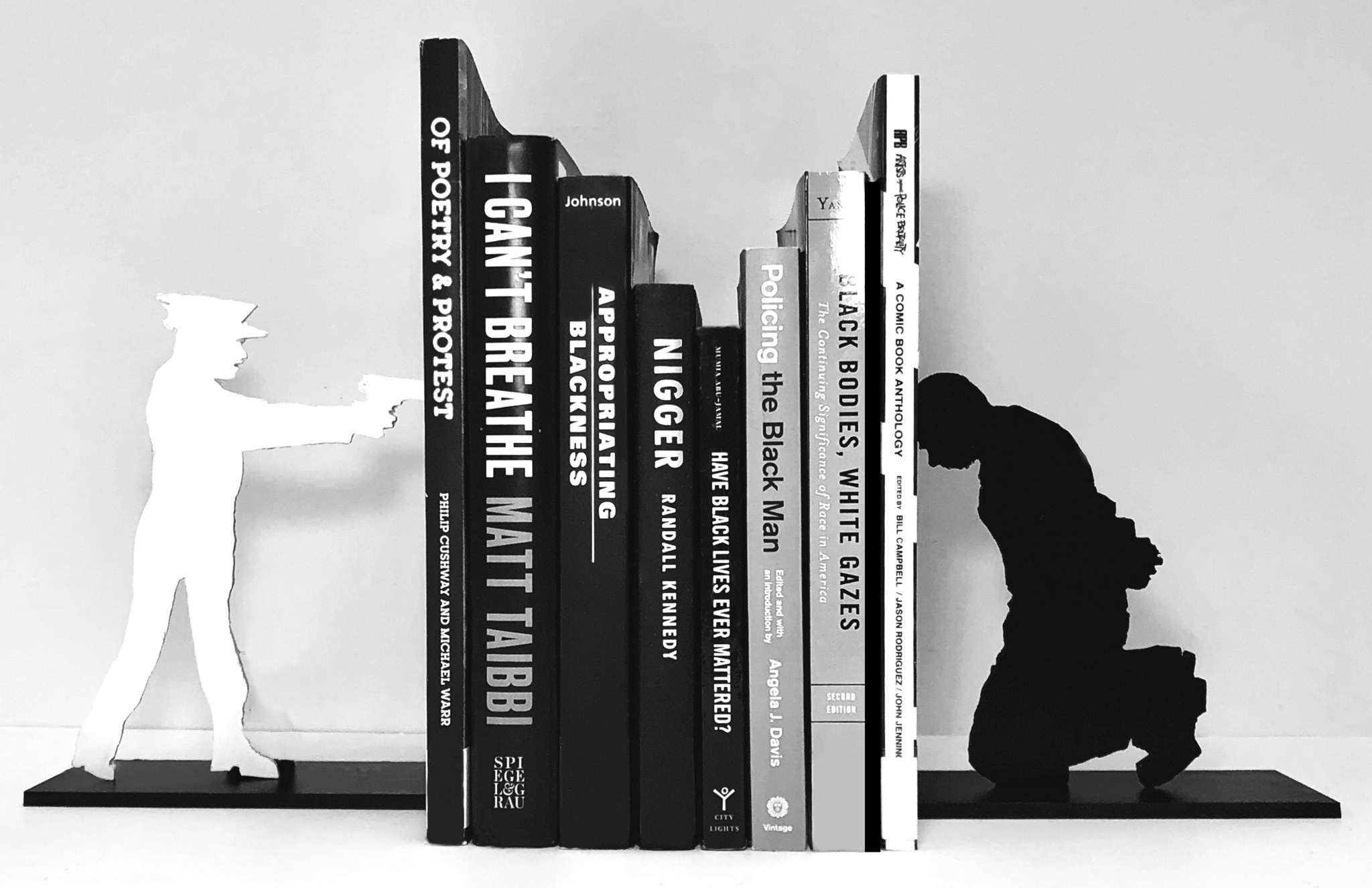 "Armed with Knowledge" bookends by Nikki Woods SVA Design